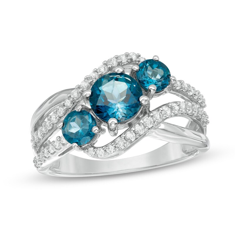 Main Image 1 of Blue Topaz and Lab-Created White Sapphire Three Stone Slant Ring in Sterling Silver
