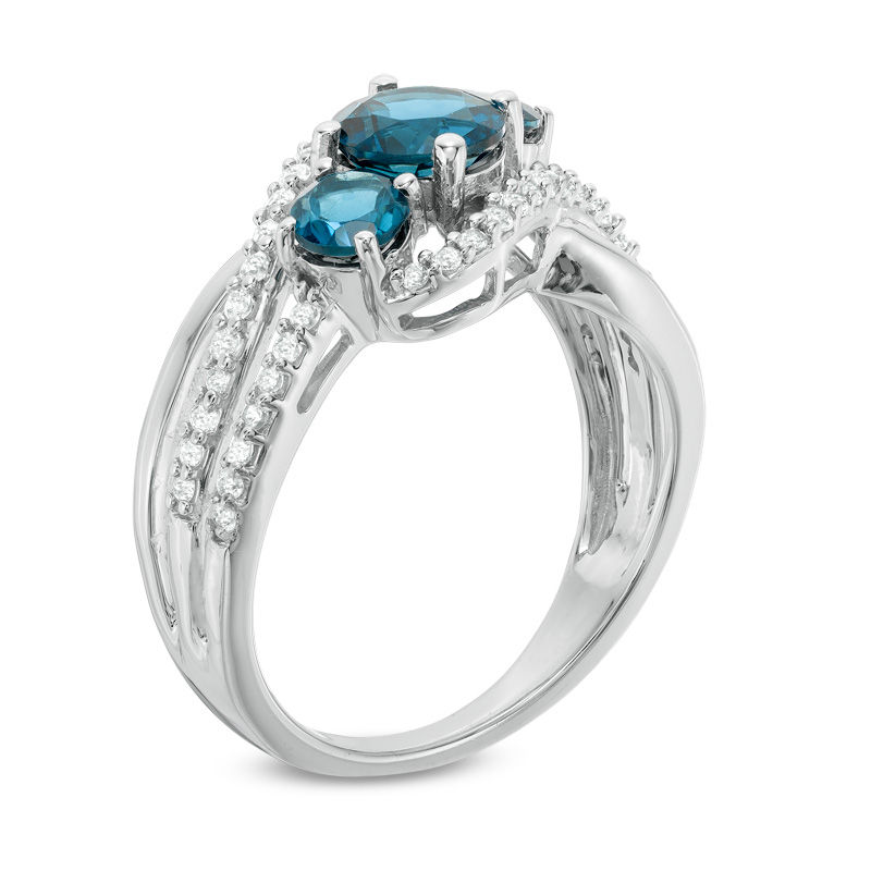 Main Image 2 of Blue Topaz and Lab-Created White Sapphire Three Stone Slant Ring in Sterling Silver