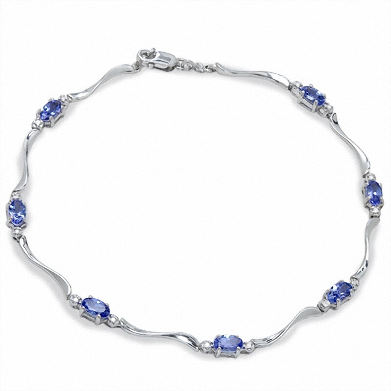 Main Image 1 of Oval Tanzanite Fashion Swirl Bracelet in 14K White Gold with Diamond Accents