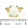 Lab-Created Oval Opal Ring in 14K Gold with Diamond Accents