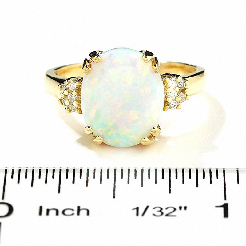 Lab-Created Oval Opal Ring in 14K Gold with Diamond Accents