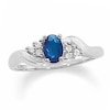 Thumbnail Image 1 of Oval Blue Sapphire and 1/20 CT. T.W. Diamond Twist Ring in 10K White Gold