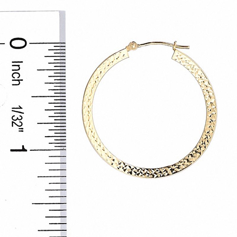 Diamond-Cut Tube Hoop Earrings in 14K Gold