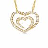 Thumbnail Image 1 of The Shared Heart® 1/4 CT. T.W. Diamond Pendant in 14K Gold