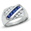 Thumbnail Image 0 of Men's 1/2 CT. T.W. Diamond and Blue Sapphire Slant Band in 14K White Gold