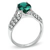Thumbnail Image 2 of Oval Lab-Created Emerald and White Sapphire Bridge Ring in 14K White Gold