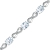 Thumbnail Image 1 of Oval Aquamarine and Diamond Accent Knot Bracelet in Sterling Silver – 7.25"