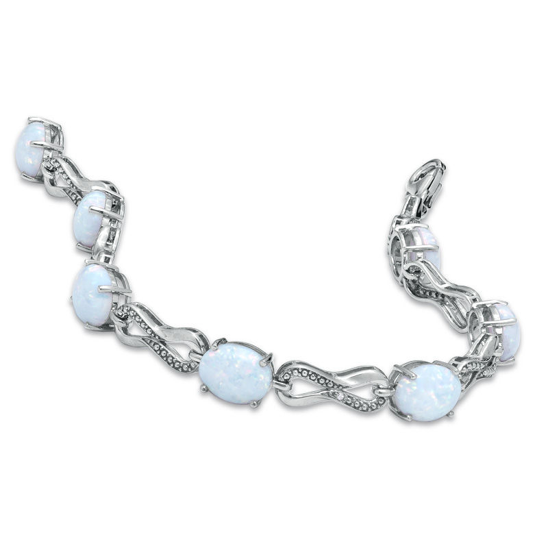 Main Image 2 of Oval Lab-Created Opal and Diamond Knot Bracelet in Sterling Silver - 7.25"