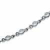 Thumbnail Image 1 of 1/10 CT. T.W. Diamond Crossover Bracelet in Sterling Silver - 7.25"
