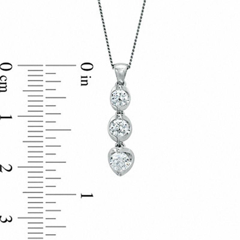 1/2 CT. T.W. Certified Canadian Diamond Three Stone Tension-Set Pendant in 14K White Gold (I/I2) - 17"