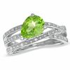 Thumbnail Image 0 of Pear-Shaped Peridot and Diamond Accent Orbit Ring in Sterling Silver
