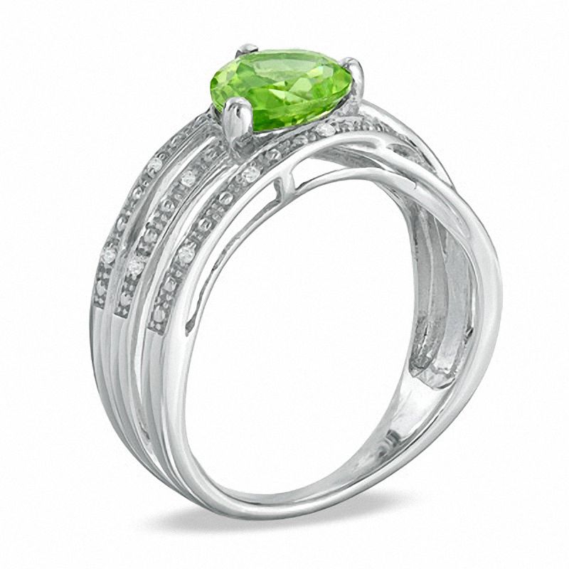 Pear-Shaped Peridot and Diamond Accent Orbit Ring in Sterling Silver