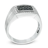 Thumbnail Image 1 of Men's Black Sapphire and 1/6 CT. T.W. Diamond Ring in Sterling Silver