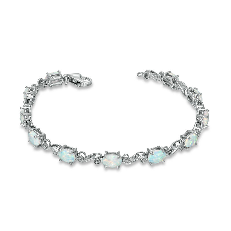 Oval Lab-Created Opal and Diamond Accent Swirl Bracelet in Sterling Silver - 7.25"