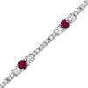 Thumbnail Image 1 of Lab-Created Ruby and White Topaz Line Bracelet in Sterling Silver - 7.25"