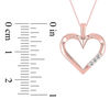 Thumbnail Image 1 of Diamond Accent Three Stone Heart Pendant in 10K Rose Gold