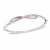 Thumbnail Image 1 of Lab-Created White Sapphire Crossover Bangle in Sterling Silver with 14K Rose Gold Plate - 7"
