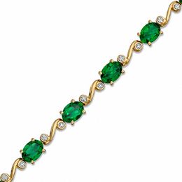 Oval Lab-Created Emerald and Diamond Accent Swirl Bracelet in Sterling Silver with 14K Gold Plate - 7.25&quot;