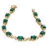 Thumbnail Image 2 of Oval Lab-Created Emerald and Diamond Accent Swirl Bracelet in Sterling Silver with 14K Gold Plate - 7.25"