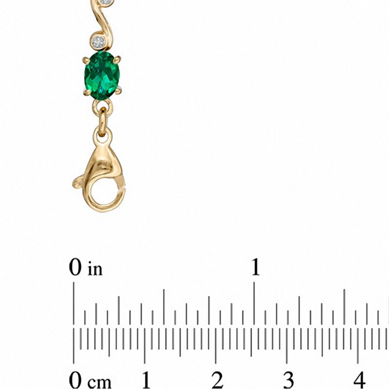 Main Image 3 of Oval Lab-Created Emerald and Diamond Accent Swirl Bracelet in Sterling Silver with 14K Gold Plate - 7.25"