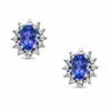 Oval Tanzanite and Diamond Accent Earrings in 14K White Gold