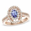 Thumbnail Image 0 of Oval Tanzanite and 1/2 CT. T.W. Diamond Ring in 14K Rose Gold