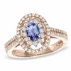 Thumbnail Image 1 of Oval Tanzanite and 1/2 CT. T.W. Diamond Ring in 14K Rose Gold