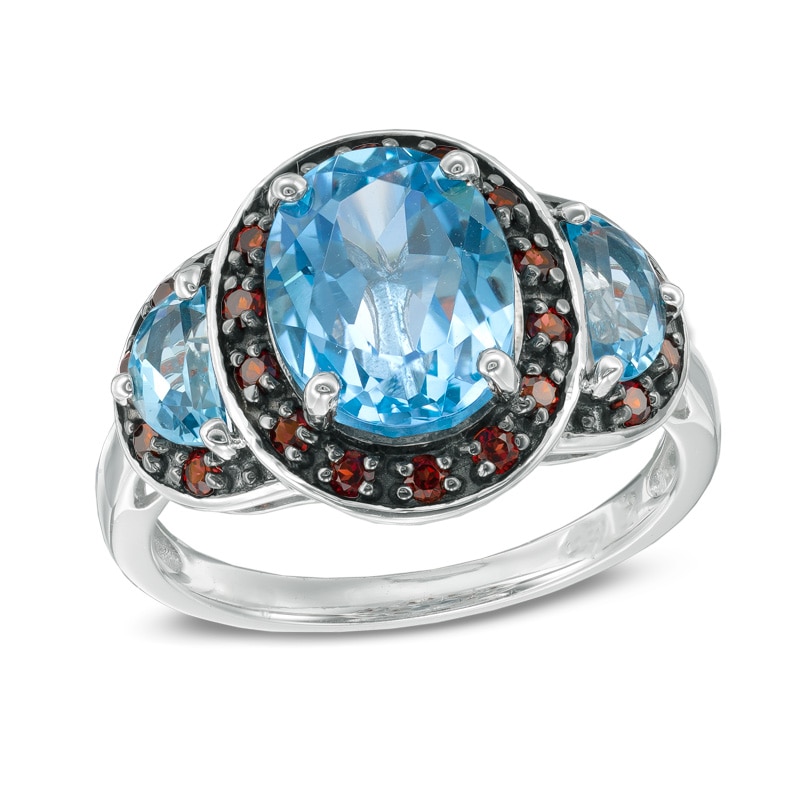 Oval Swiss Blue Topaz and Garnet Frame Ring in Sterling Silver