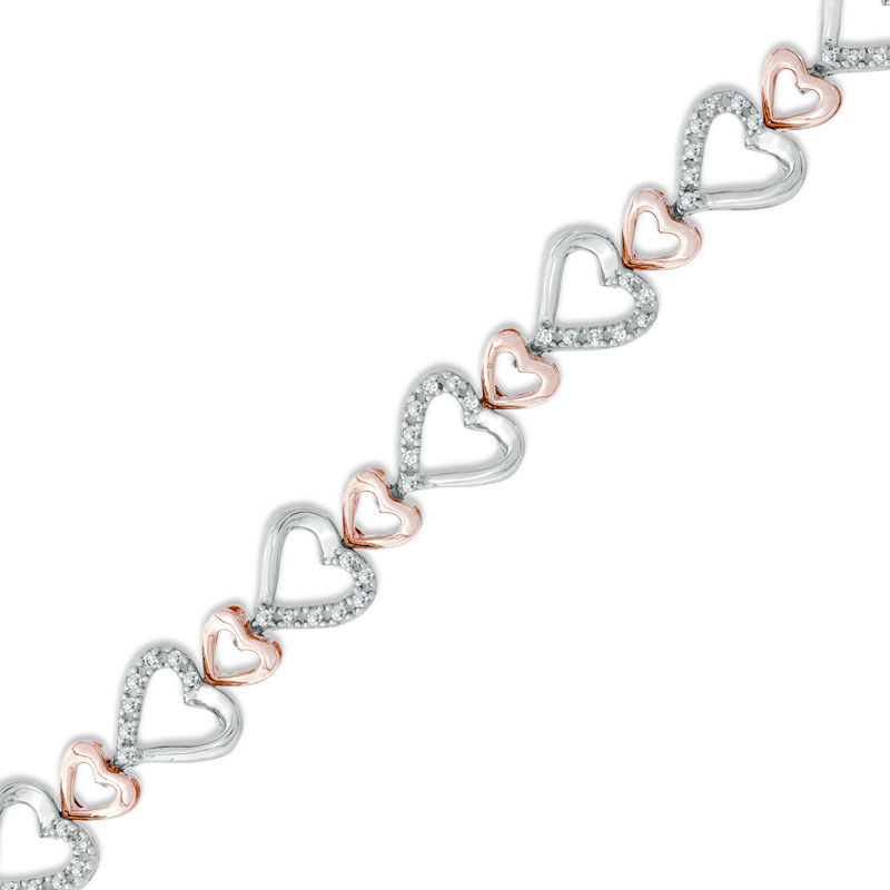 Main Image 1 of 1/3 CT. T.W. Diamond Fluttering Hearts Bracelet in Sterling Silver and 10K Rose Gold