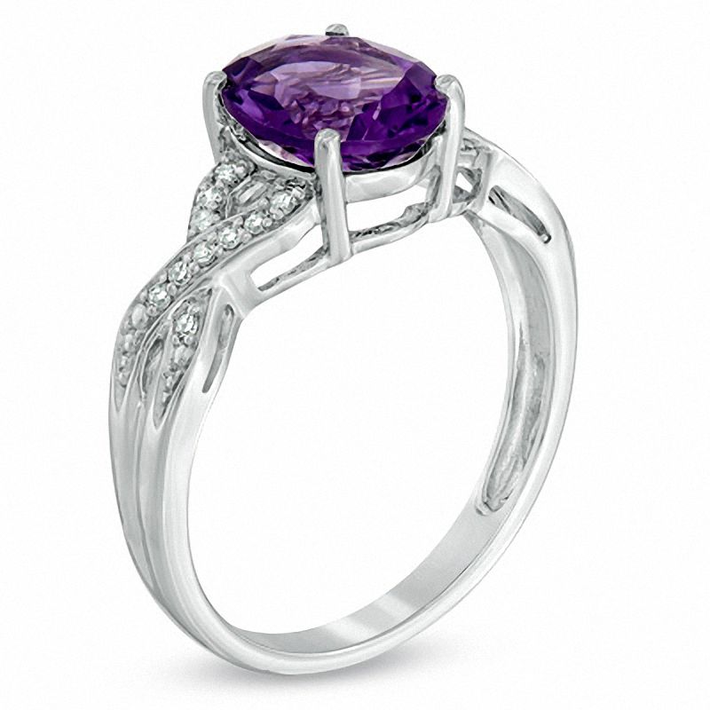 Oval Amethyst and 1/10 CT. T.W. Diamond Ring in 14K White Gold