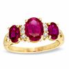 Thumbnail Image 0 of Oval Lab-Created Ruby and White Sapphire Three Stone Ring in 14K Gold