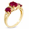 Thumbnail Image 1 of Oval Lab-Created Ruby and White Sapphire Three Stone Ring in 14K Gold