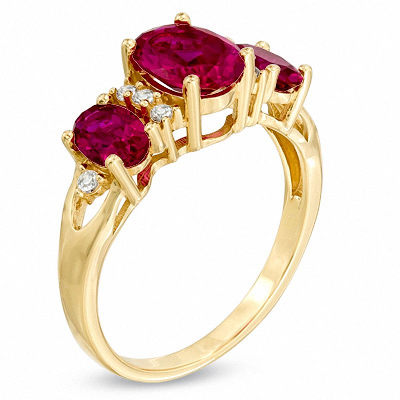 Oval Lab-Created Ruby and White Sapphire Three Stone Ring in 14K Gold