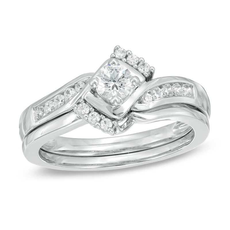 1/2 CT. T.W. Diamond Tri-Sides Bridal Set in 10K White Gold