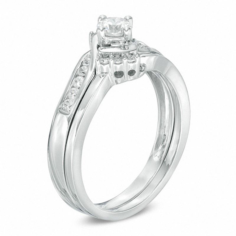 1/2 CT. T.W. Diamond Tri-Sides Bridal Set in 10K White Gold