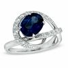 Thumbnail Image 0 of Oval Lab-Created Blue and White Sapphire Swirl Ring in 14K White Gold