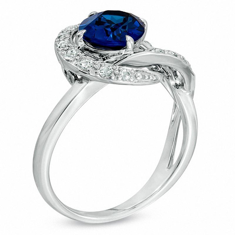 Oval Lab-Created Blue and White Sapphire Swirl Ring in 14K White Gold