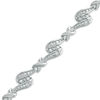 Thumbnail Image 1 of 1/4 CT. T.W. Diamond "X" Swirl Bracelet in Sterling Silver - 7.25"