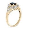 Thumbnail Image 2 of Oval Blue Sapphire and 1/3 CT. T.W. Baguette and Round Diamond Ring in 14K Gold