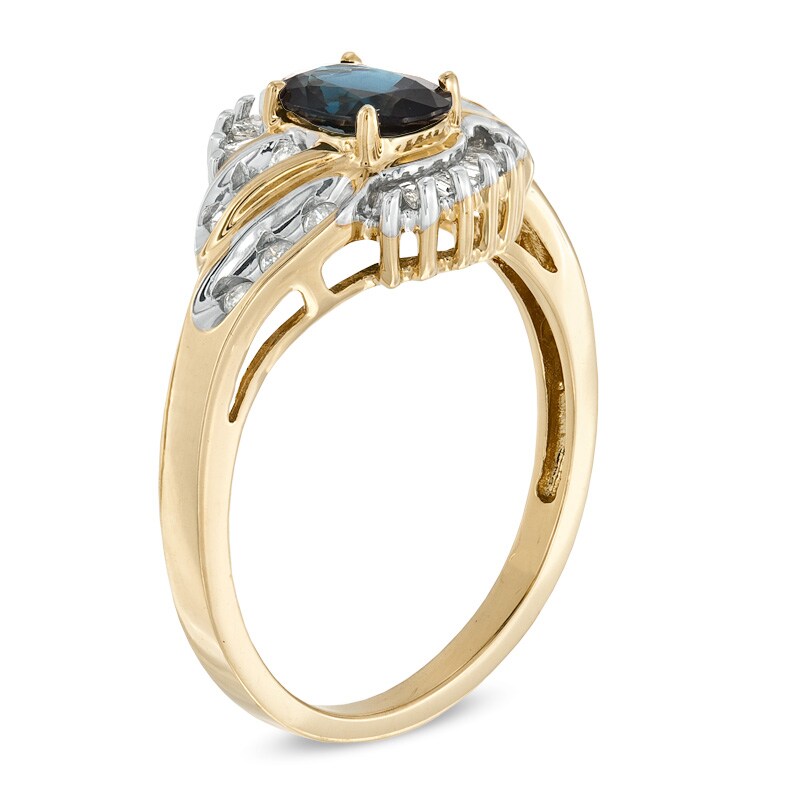 Main Image 2 of Oval Blue Sapphire and 1/3 CT. T.W. Baguette and Round Diamond Ring in 14K Gold