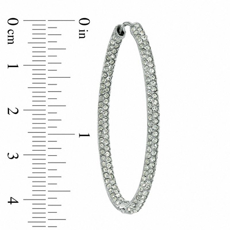 Crystal Inside-Out Oval Hoop Earrings in White Rhodium Brass