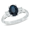 Thumbnail Image 0 of Oval Blue Sapphire and 1/5 CT. T.W. Diamond Ring in 14K White Gold