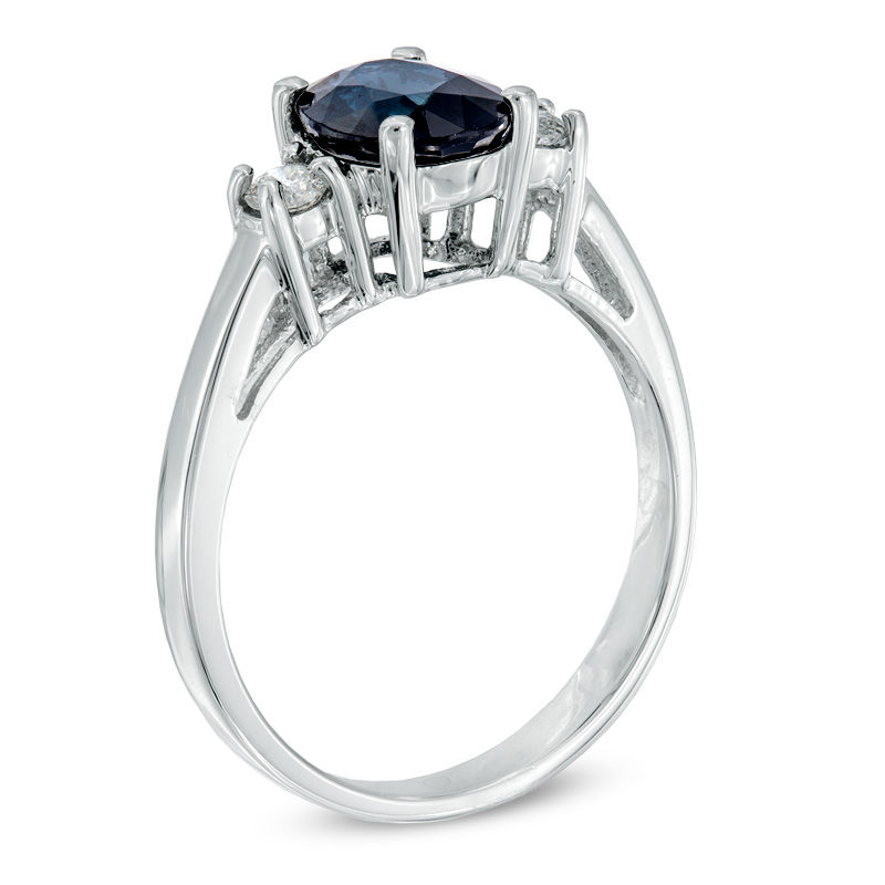 Oval Blue Sapphire and 1/5 CT. T.W. Diamond Ring in 14K White Gold