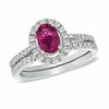 Thumbnail Image 0 of Oval Pink Tourmaline and 1/2 CT. T.W. Diamond Bridal Set in 14K White Gold
