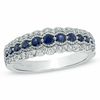 Vera Wang Love Collection Blue Sapphire and 1/5 CT. T.W. Diamond Anniversary Band in 14K White Gold