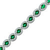 Thumbnail Image 1 of Oval Lab-Created Emerald and Diamond Accent Frame Bracelet in Sterling Silver - 7.5"