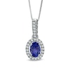 Thumbnail Image 0 of Oval Tanzanite and 1/6 CT. T.W. Diamond Frame Pendant in 14K White Gold