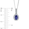 Thumbnail Image 1 of Oval Tanzanite and 1/6 CT. T.W. Diamond Frame Pendant in 14K White Gold