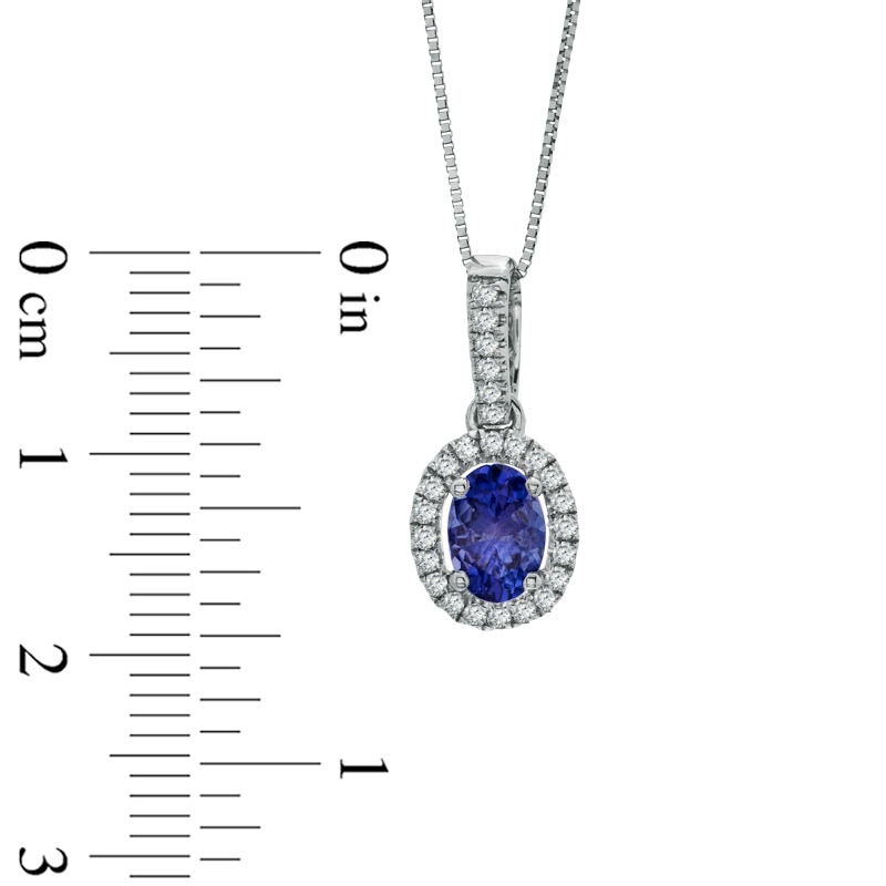 Oval Tanzanite and 1/6 CT. T.W. Diamond Frame Pendant in 14K White Gold