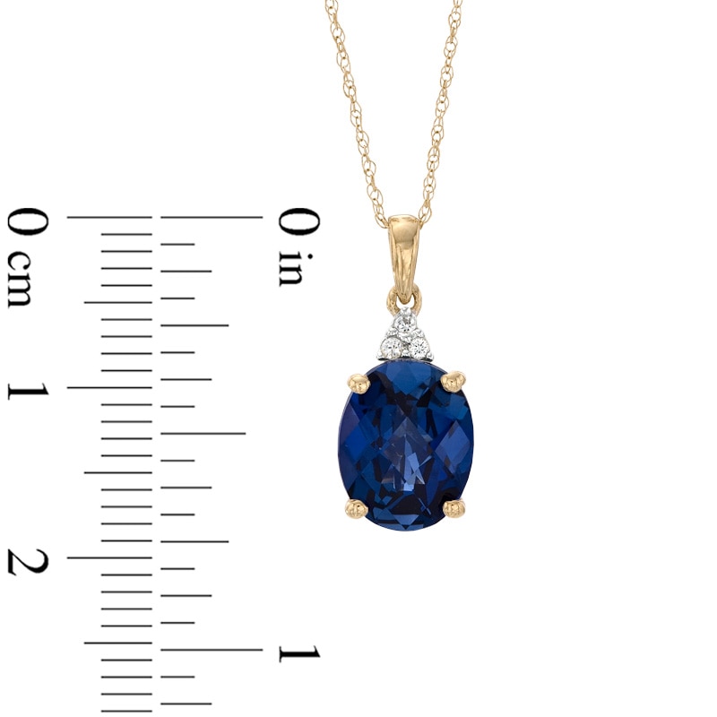 Main Image 2 of Oval Lab-Created Blue and White Sapphire Pendant in 10K Gold